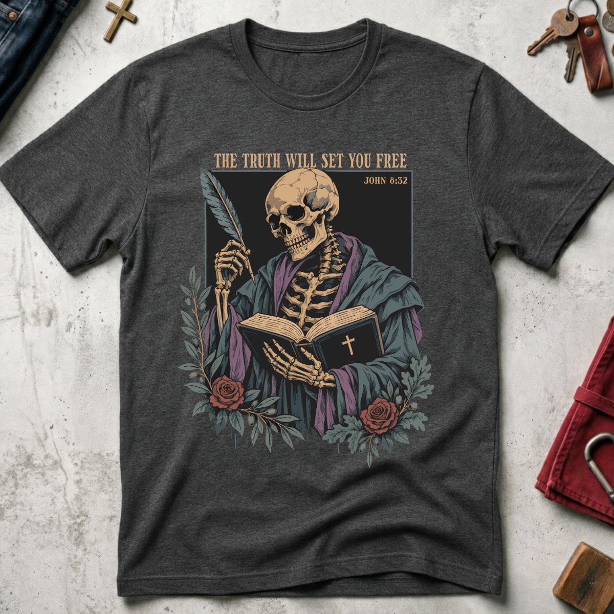 The Truth Will Set You Free Christian T-shirt in Dark Heather Grey with a robed skeleton, open Bible, feather and roses.