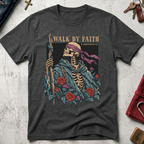Walk by Faith Christian T-shirt in Dark Heather with a gothic skeleton pilgrim, wooden staff, cross necklace, roses and thistles.