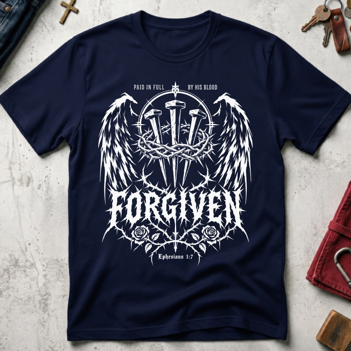 Forgiven Ephesians 1:7 Christian T-shirt in Navy with gothic wings, three nails, a crown of thorns and roses.
