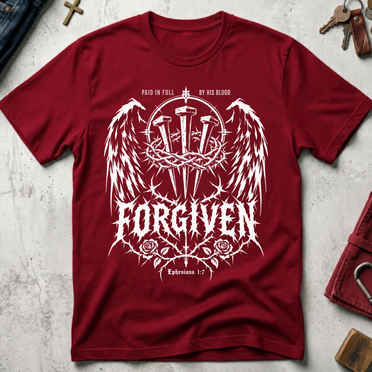 Forgiven Ephesians 1:7 Christian T-shirt in Cardinal Red with gothic wings, three nails, a crown of thorns and roses.
