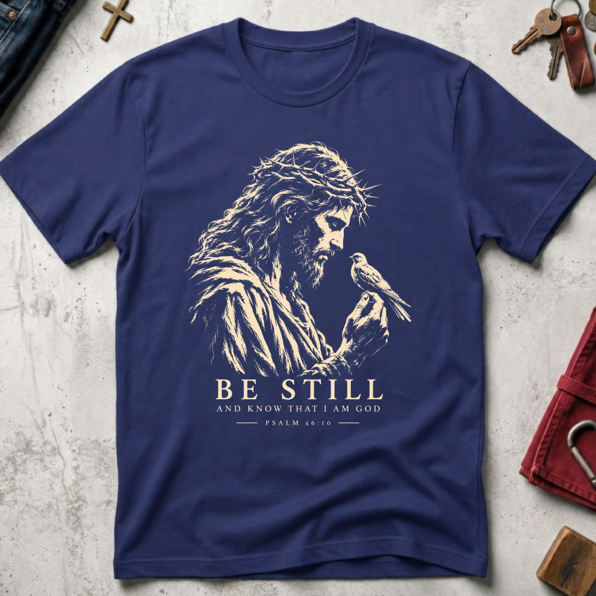 Be Still and Know Psalm 46:10 Christian T-shirt in Metro Blue with Jesus and bird illustration