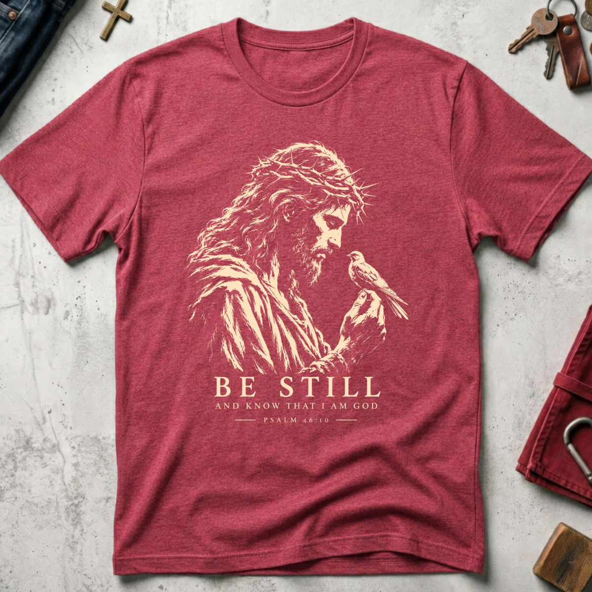 Be Still and Know Psalm 46:10 Christian T-shirt in Heather Cardinal with Jesus and bird illustration